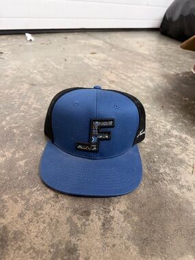 Blue and Black Trucker Hat with Aztec F Patch